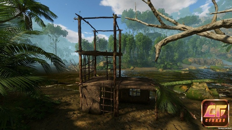 Cảnh người chơi dựng lều tạm cạnh bờ suối, sổ tay mở ra và vật liệu xếp ngăn nắp trên mặt đất